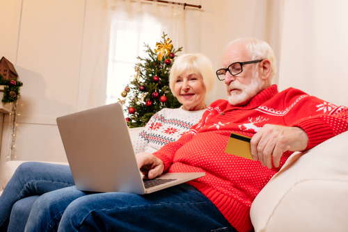 Older couple shopping online